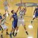 Chelsea's Nate Bossory makes a jump shot as he is bing graded by Salem's Cameron Werner during Chelsea's holiday basketball tournament on Thursday Dec. 27th.
Courtney Sacco I AnnArbor.com 